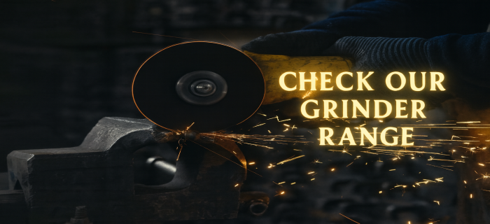 Industrial grinders on workshop bench – angle grinders, bench grinders and power tools supplied by Jones & Clark